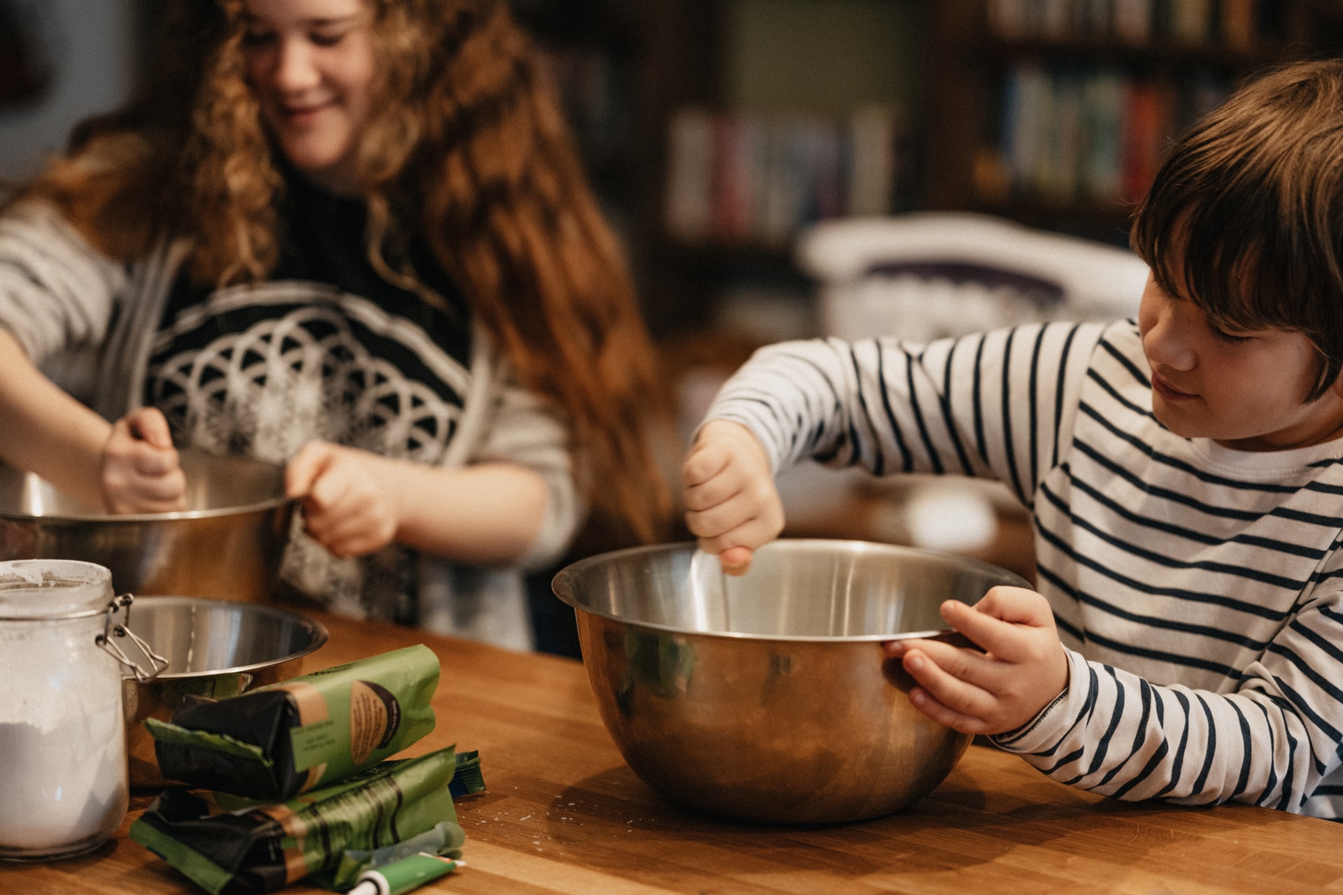 Kids making cake batter for the bake sale. A simple way for kids to raise money at school.